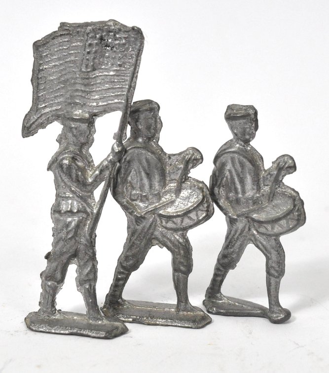 Three Unpainted Lead Soldiers