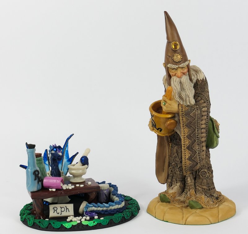 Two Fanciful Pharmacist Figurines