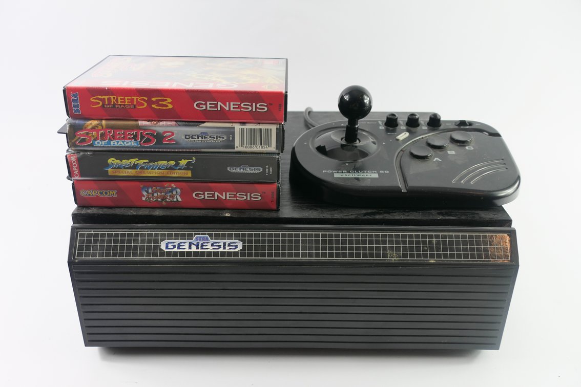 Sega Genesis Games, Asciiware Genesis Arcade Stick Controller, and Storage Box