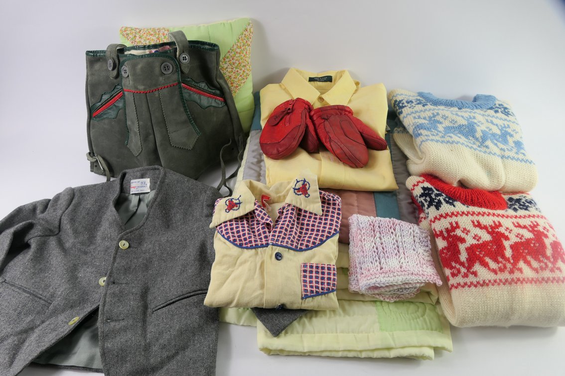 Selection of Children's Clothing and Quilt