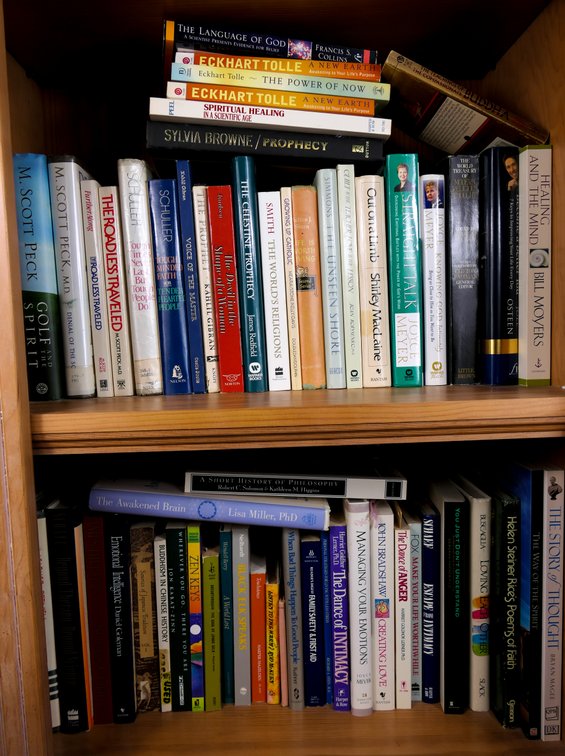 Two Shelves of Religious and Spiritual Books