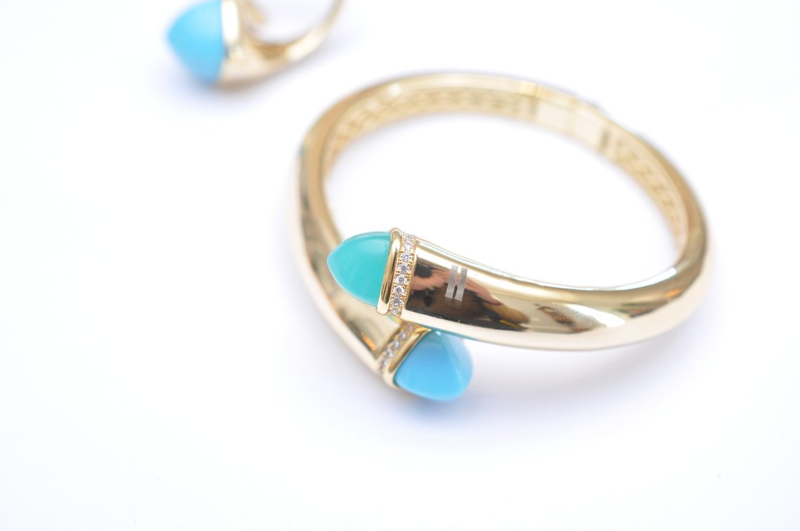 Halo Jewelry from the Ciara Collection Featuring a Bypass Ring and a Hinged Cuff Bracelet