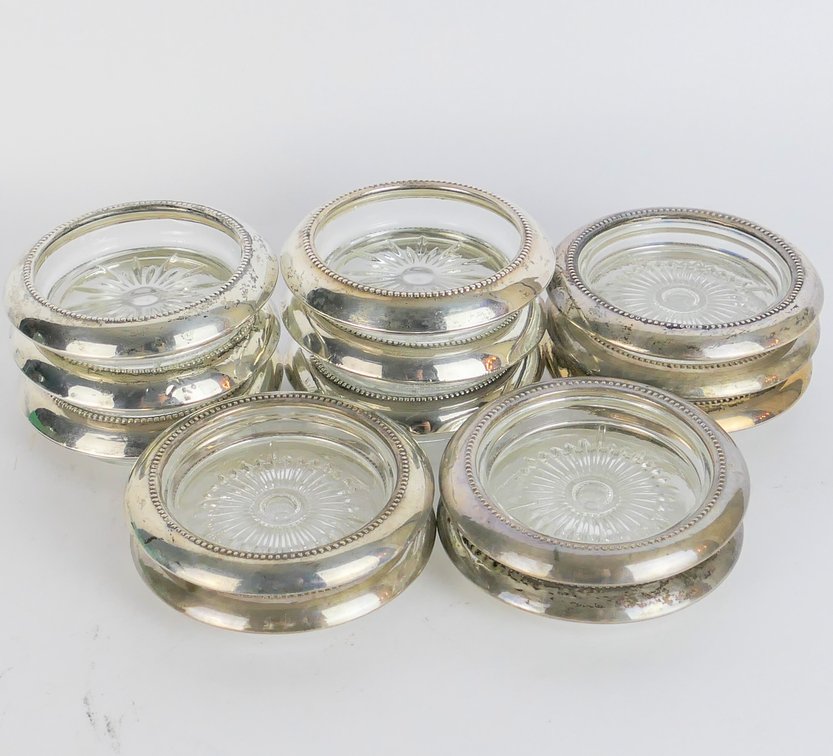 Thirteen Sterling Silver and Glass Coasters