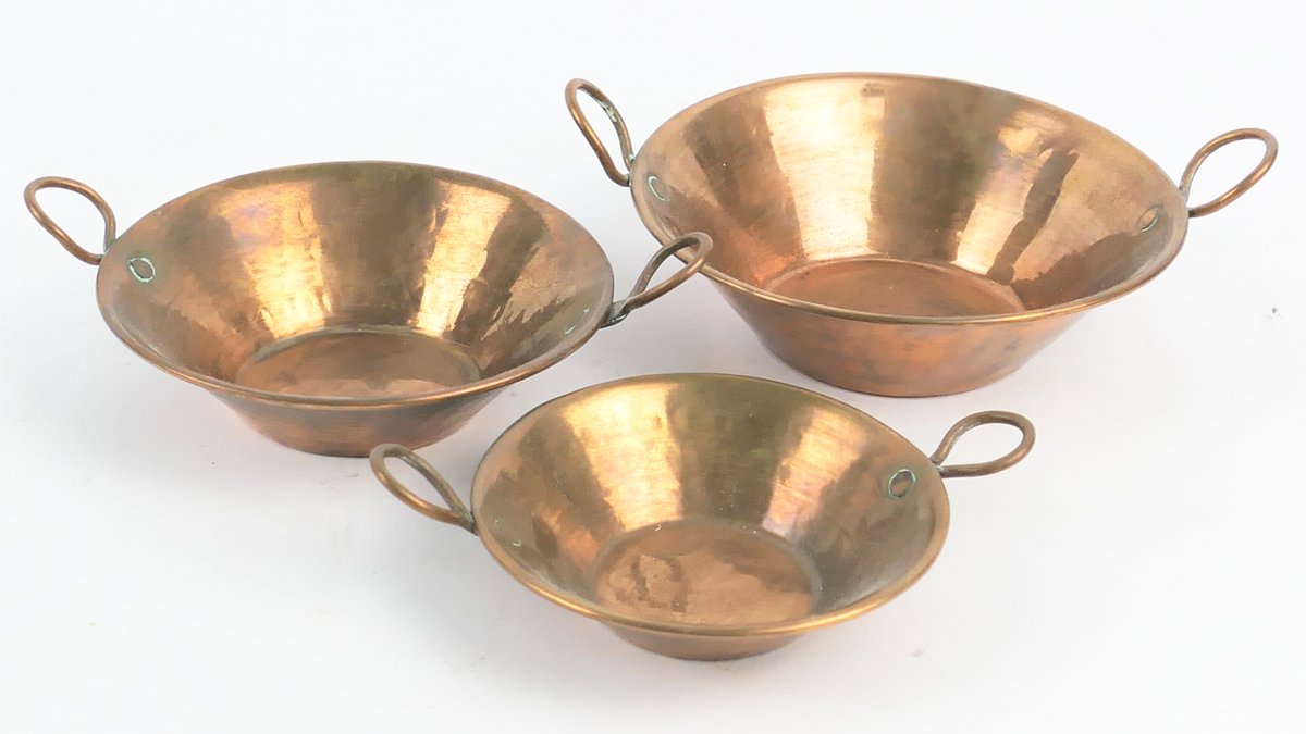 Three Graduated Copper Dishes