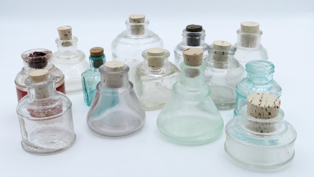 Thirteen Glass Ink Bottles