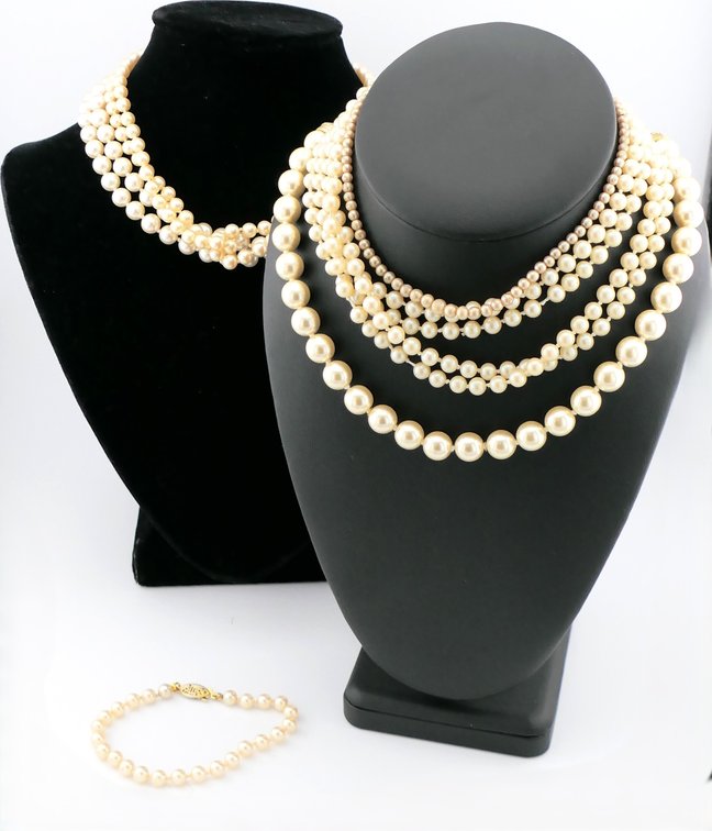 Six Pearl Necklaces