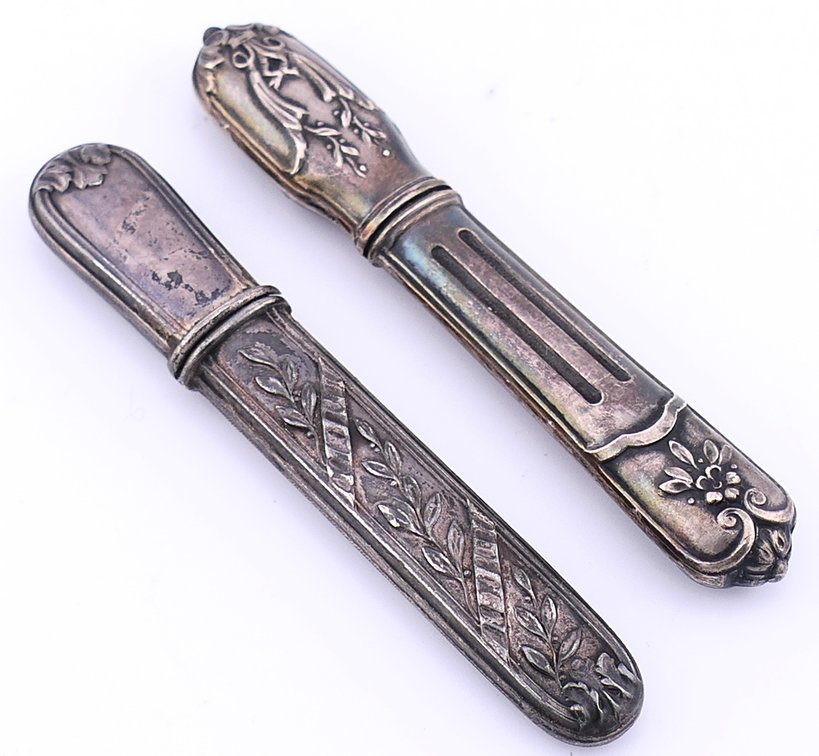 Two Silver Needle Cases