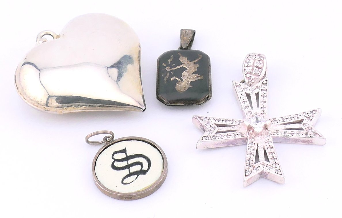 Four Sterling Pendants