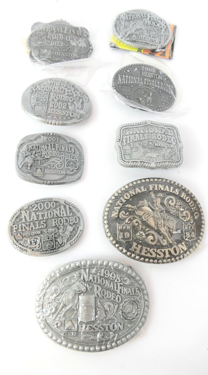 Nine Hesston National Finals Rodeo Belt Buckles