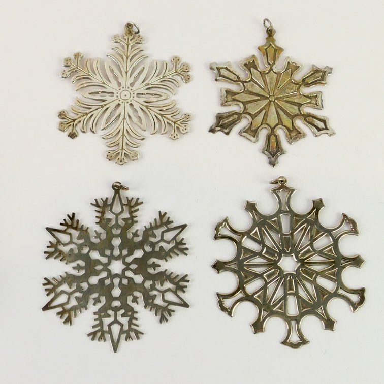 Four MMA Sterling Snowflake Ornaments 1973, 1977-1979