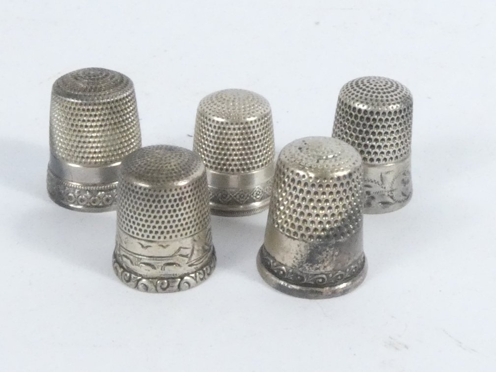 Five Silver Thimbles