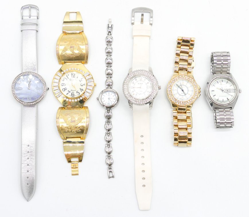 Six Silver and Gold Tone Watches