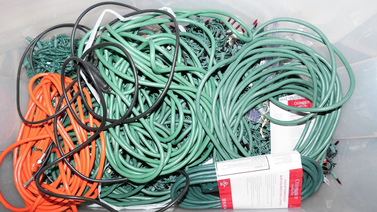 Tote of Christmas Lights and Extension Cords