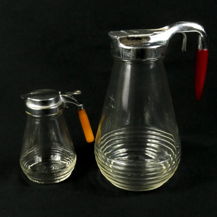 Two Bakelite Handle Pitchers