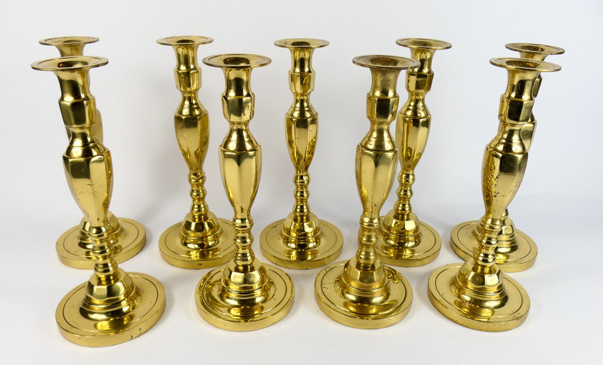 Nine Brass Candlesticks