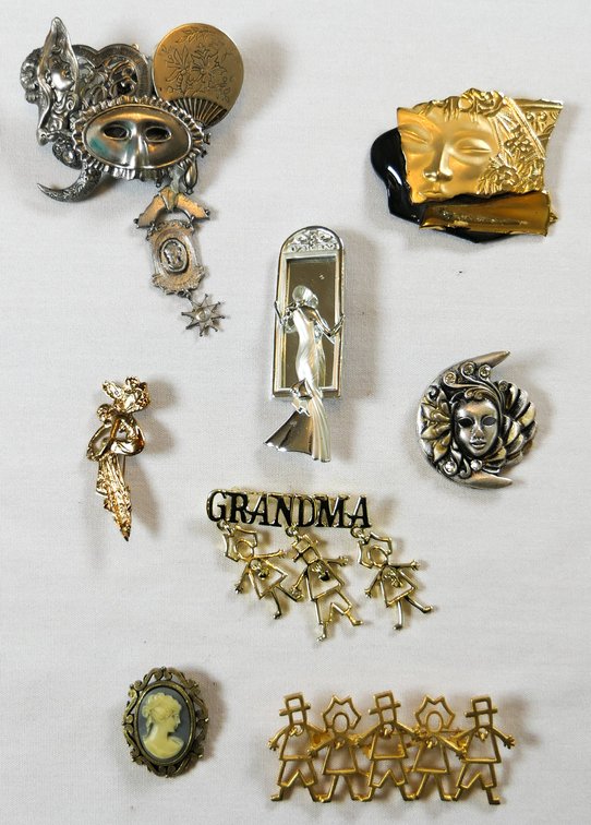 Brooches with Faces and Figures
