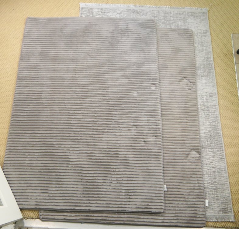 Three Gray Rugs