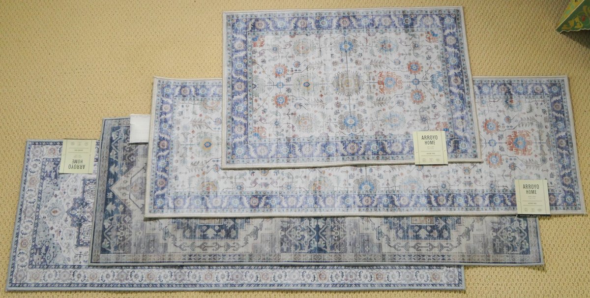 Four Blue and Gray Accent Rugs