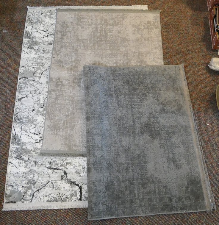 Three Gray Rugs