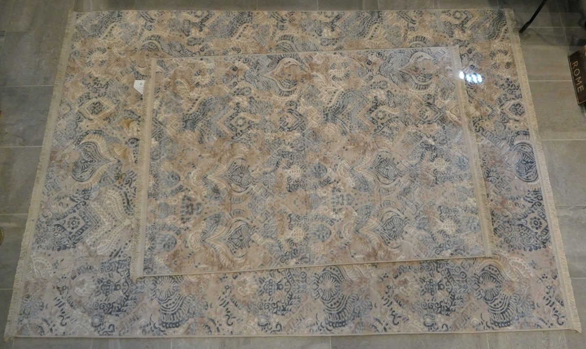 Two Matching Textured Rugs