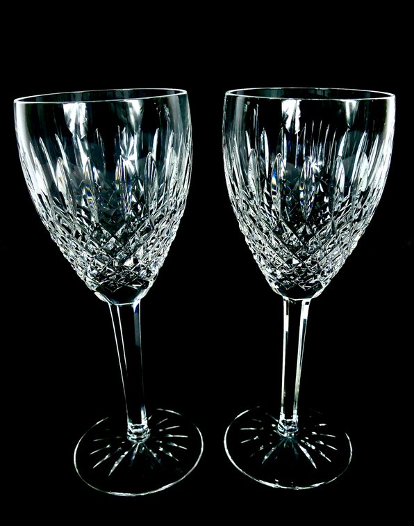 Two crystal goblets by Waterford in the Castlemaine pattern, featuring a geometric accent pattern. Marked on the bottoms Waterford.