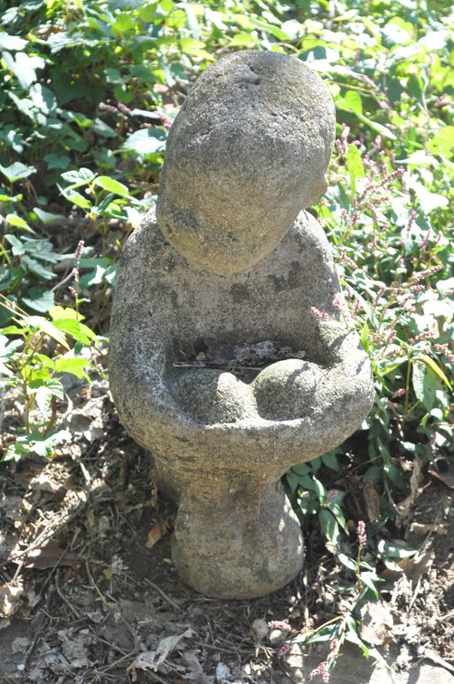 Sitting Concrete Statue
