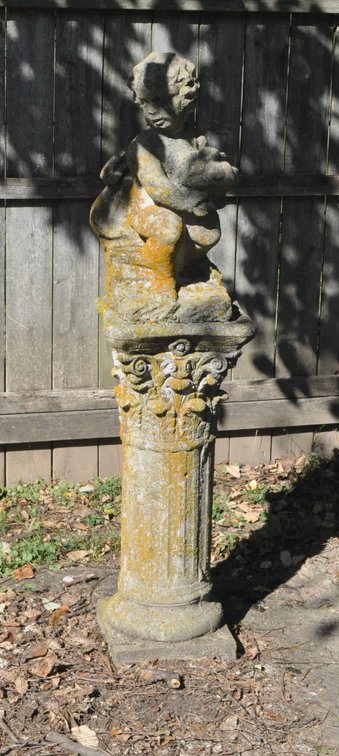 Concrete Statue on Concrete Pillar