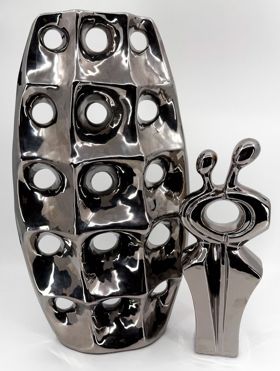 Two Silver Tone Statues