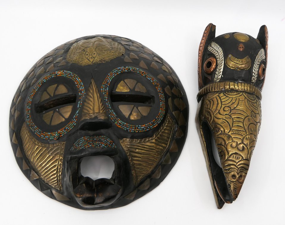 Two Masks with Metal Accents