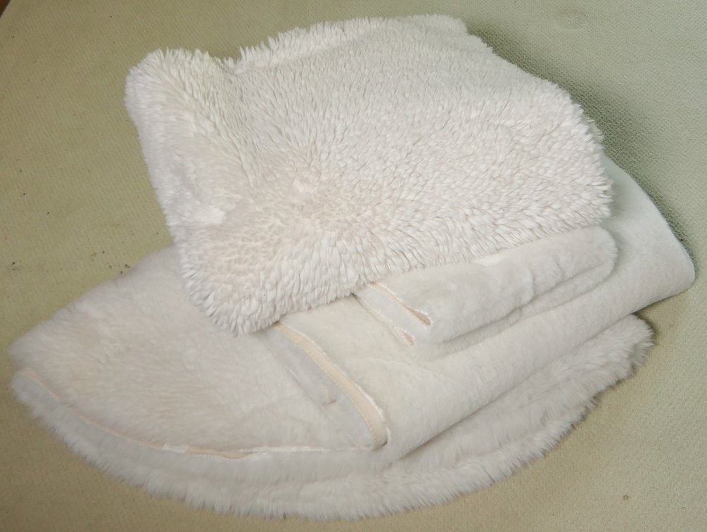 Four Furry Cream Rugs