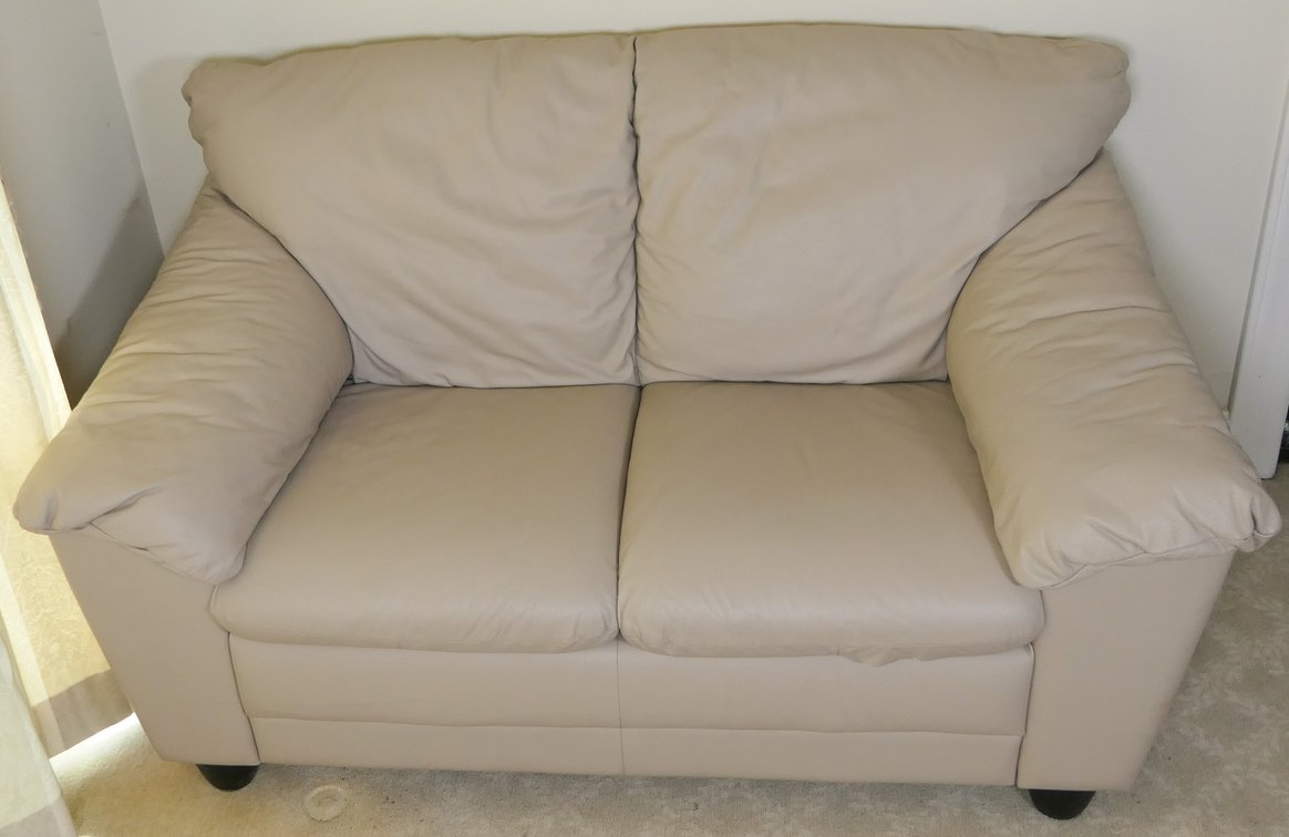 Beige Vinyl Loveseat