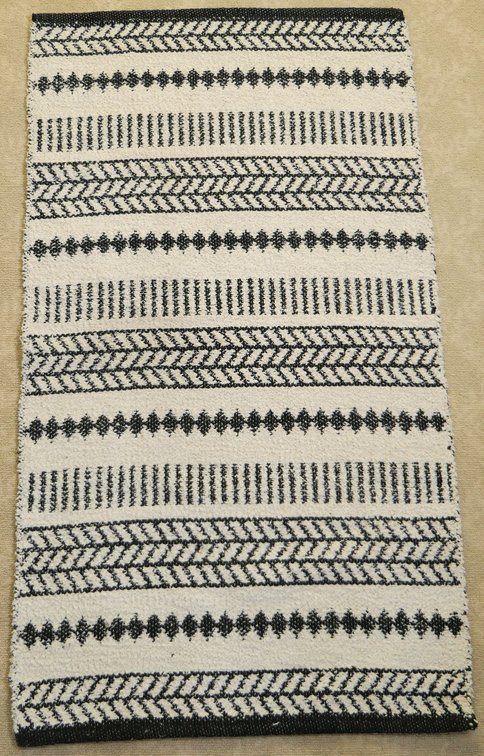 Cream and Black Accent Rug
