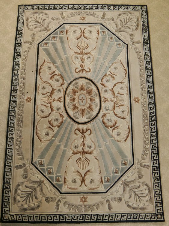 Carved Taupe and Black Rug