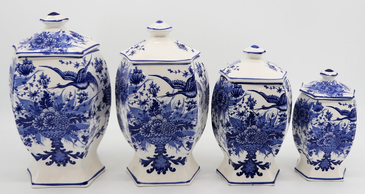 Four Blue and White Canisters