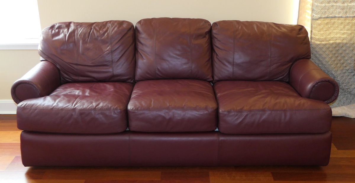 Three Cushion Oxblood Vinyl Couch by La Z Boy