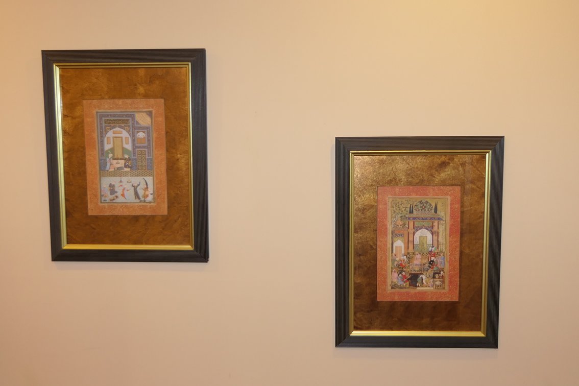 Pair of Mounted Plaques Featuring Persian Scenes