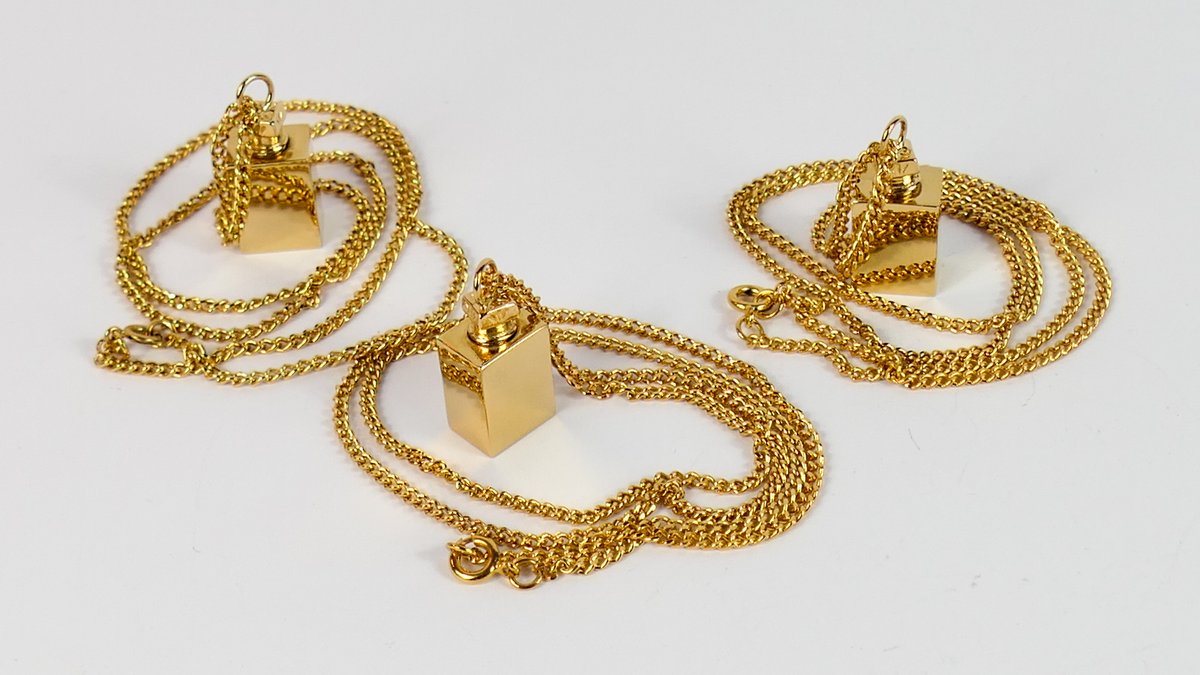 Three Vintage miniature Gold Tone Bottle Pendant Necklaces