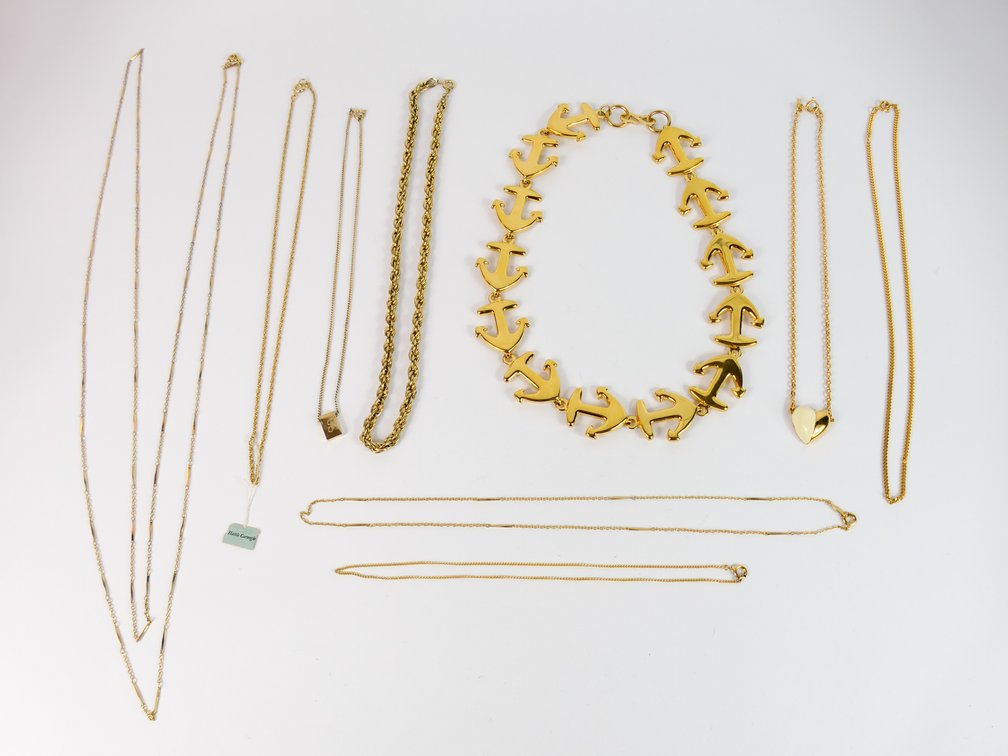 Nine Gold Tone Necklaces