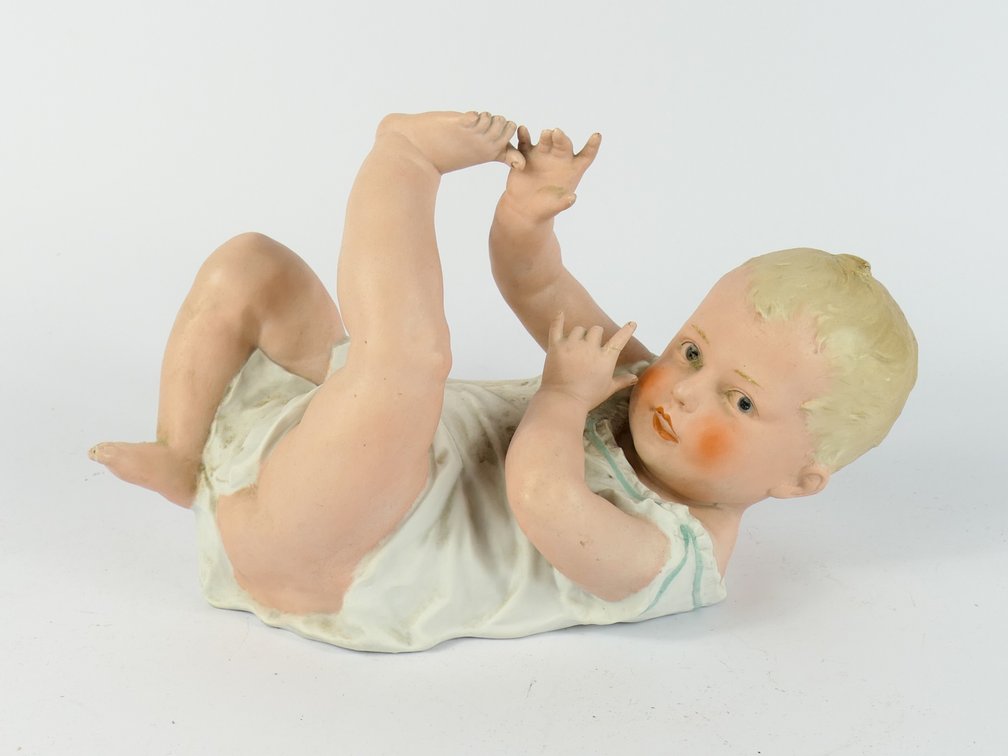 Large Bisque Porcelain Piano Baby