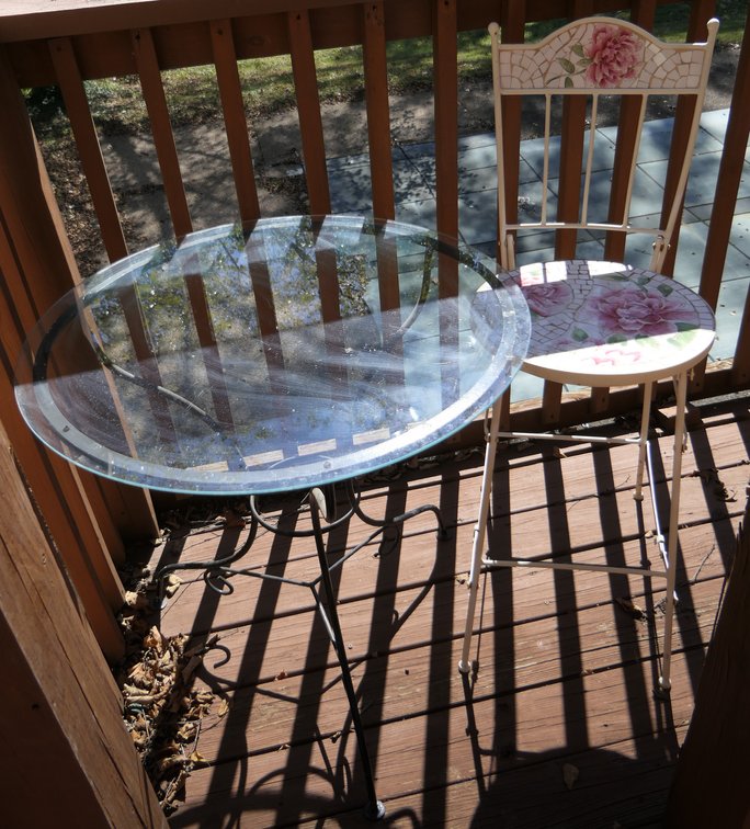 Glass Top Table and Mosaic Style Chair