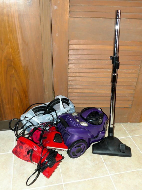 Three Vacuum Cleaners
