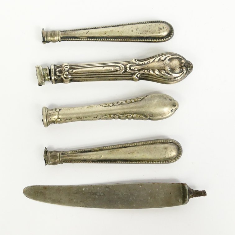 Four Silver Knife Handles