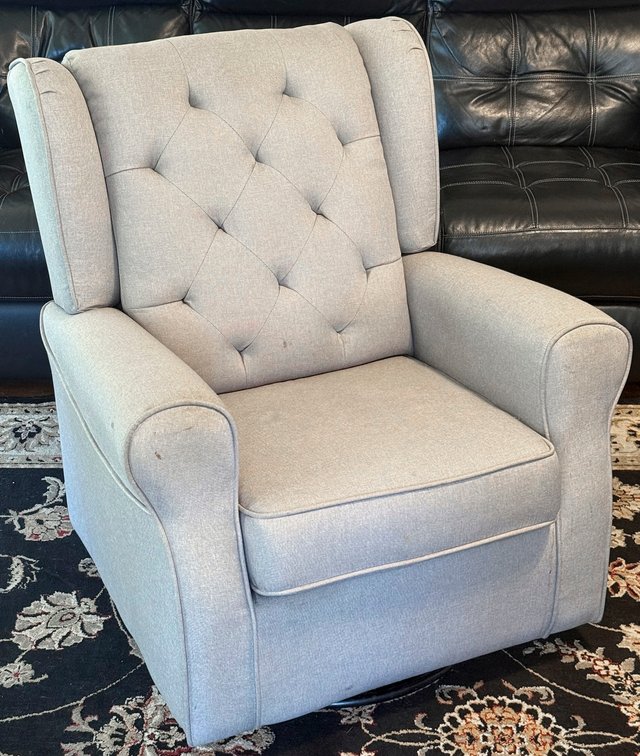 Gray Upholstered Swivel Rocker