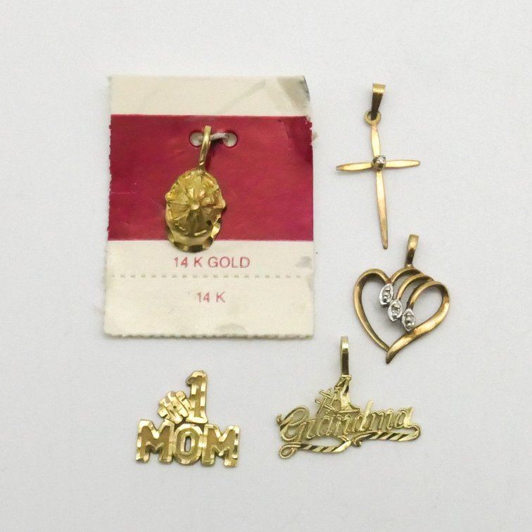 Five Small Gold Charms and Pendants
