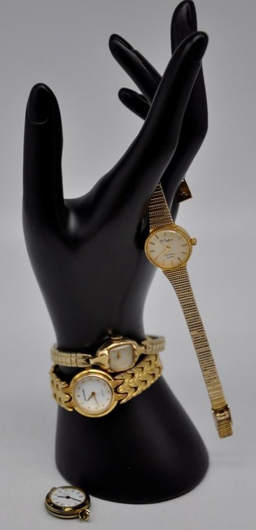 Four Gold-tone Timepieces