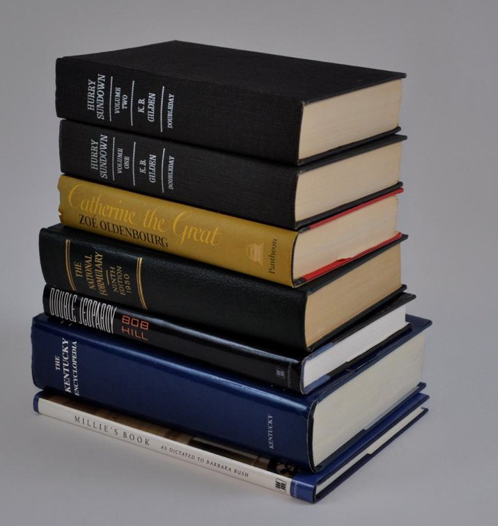 Seven Hardcover Books