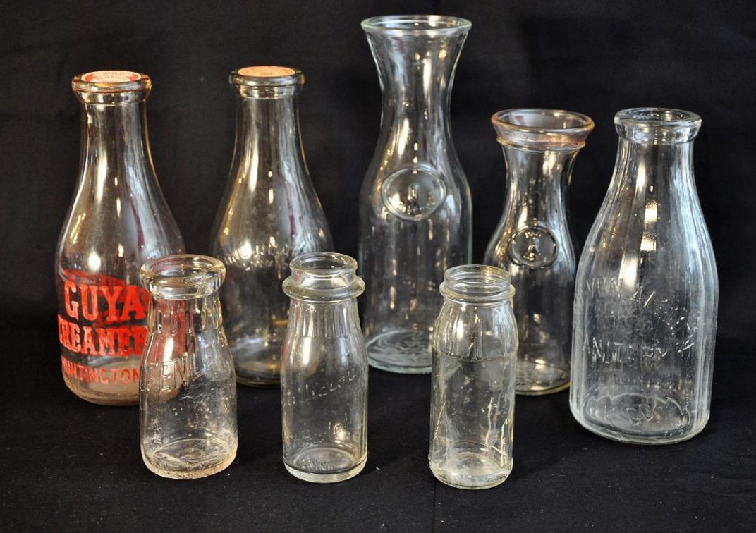 Eight Vintage Glass Milk Bottles
