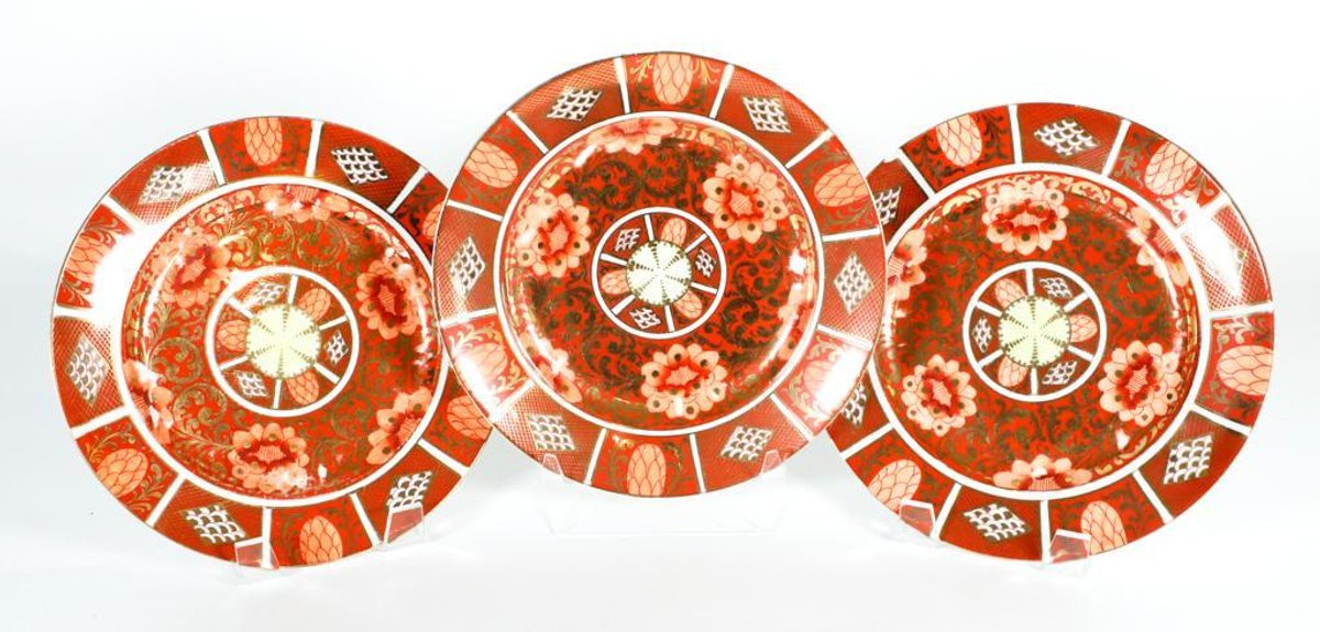 Three Luster Glazed Plates