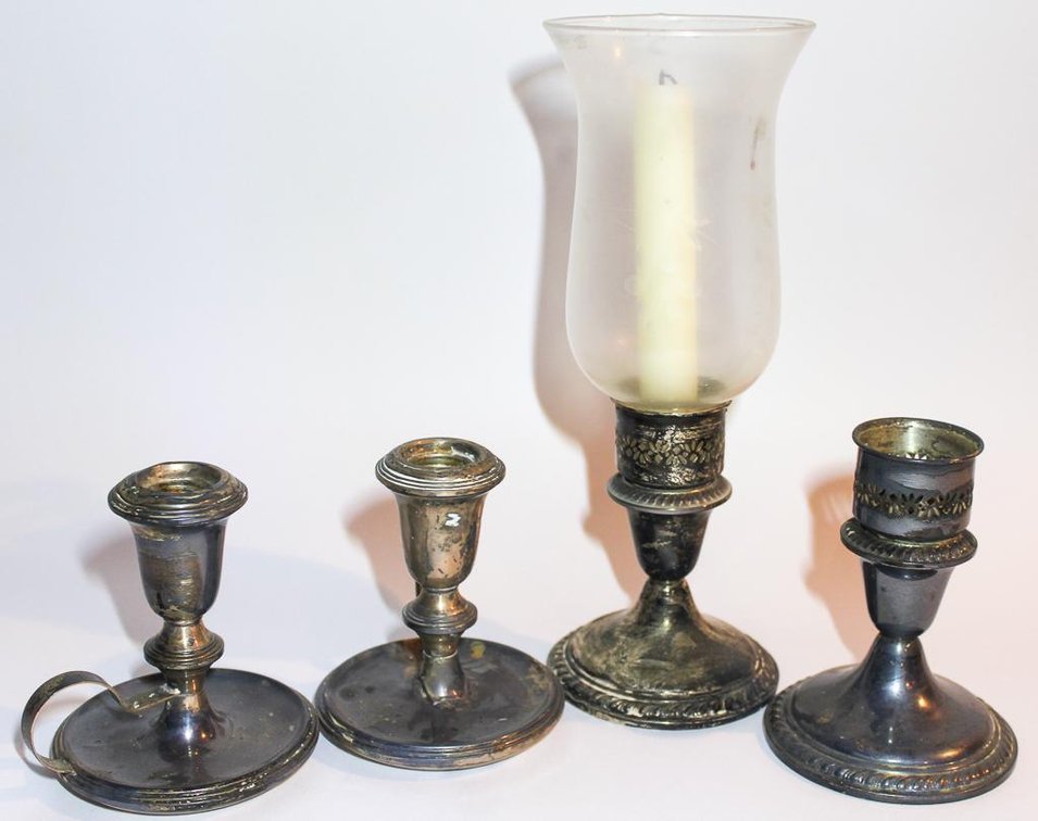Four Silver Candle Holders