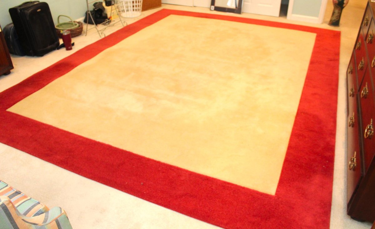 Large Beige and Red Area Rug